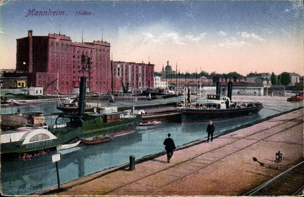 Mannheim. Porto. — Vista do porto com vapor e um grande edifício vermelho — editor Rhétiischer Kunst- und Postkarten-Verlag, n° 29965 - Frente