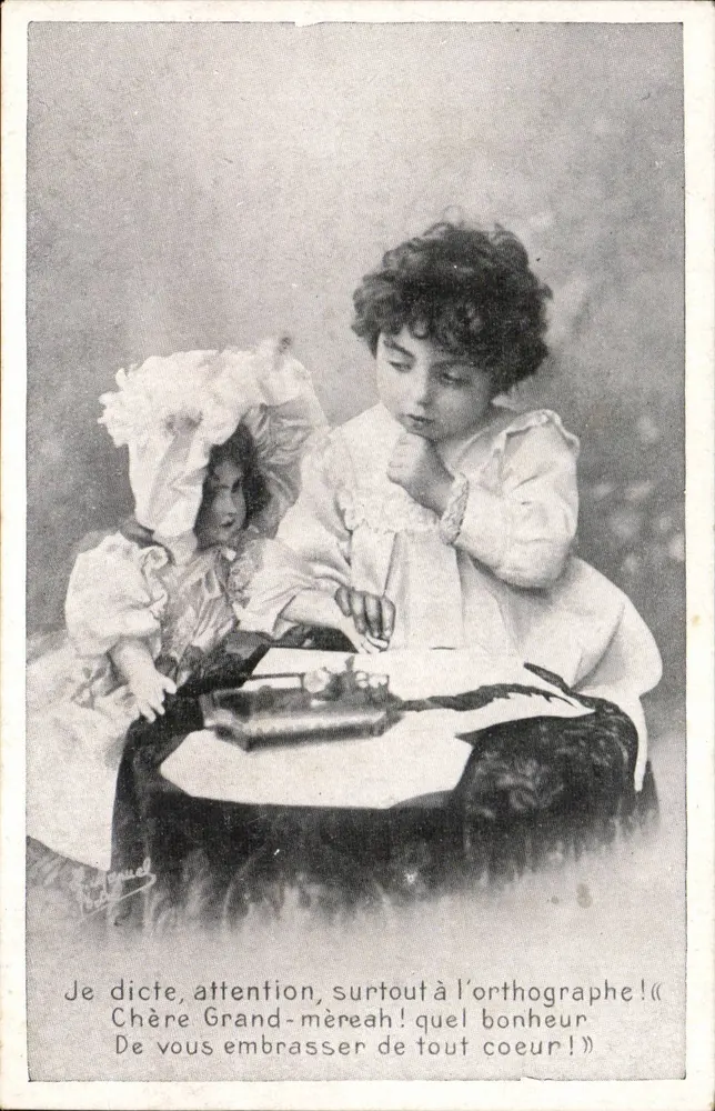 Niño dictando a una muñeca — Editor: E. Guenael — Número de serie no visible - Anverso