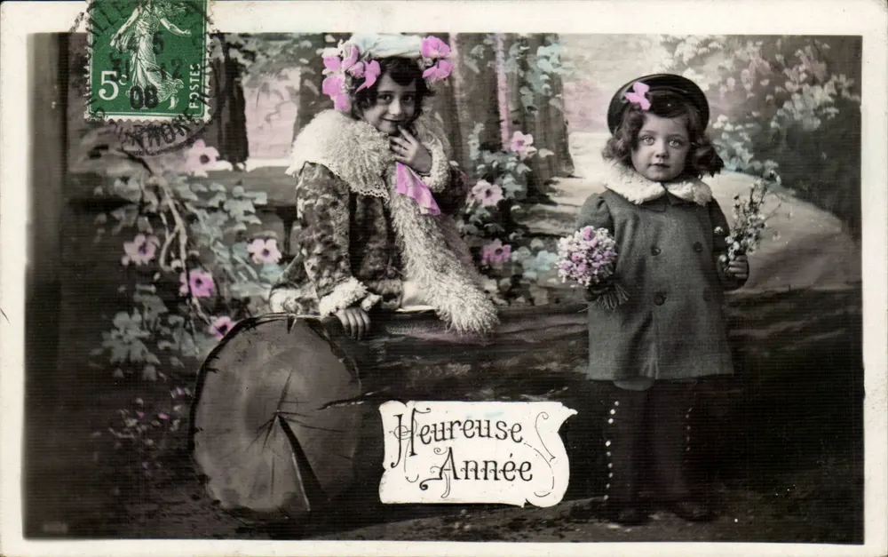 Zwei Kinder im Garten — 'Heureuse Année' — Verlag nicht sichtbar - Vorderseite