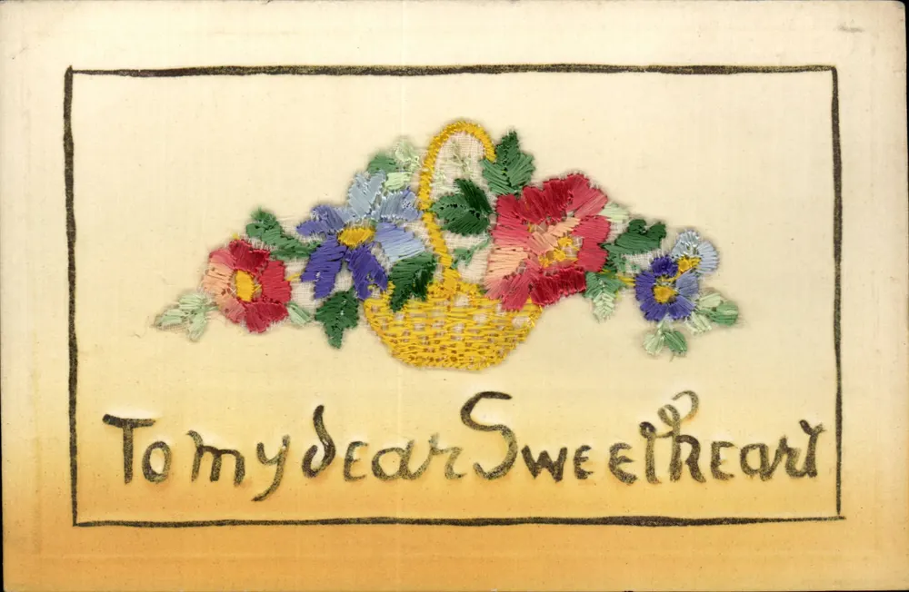 Blütenbukett in einem Korb — gestickte Grußkarte — handschriftlicher Text 'An meine liebe Süße' - Vorderseite