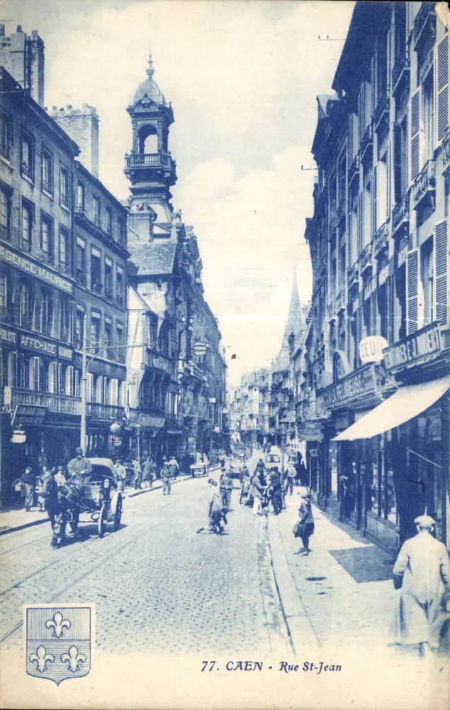 CAEN - Rue St-Jean — vista da rua com campanário e comércios — editor GEUI, n°77 - Frente