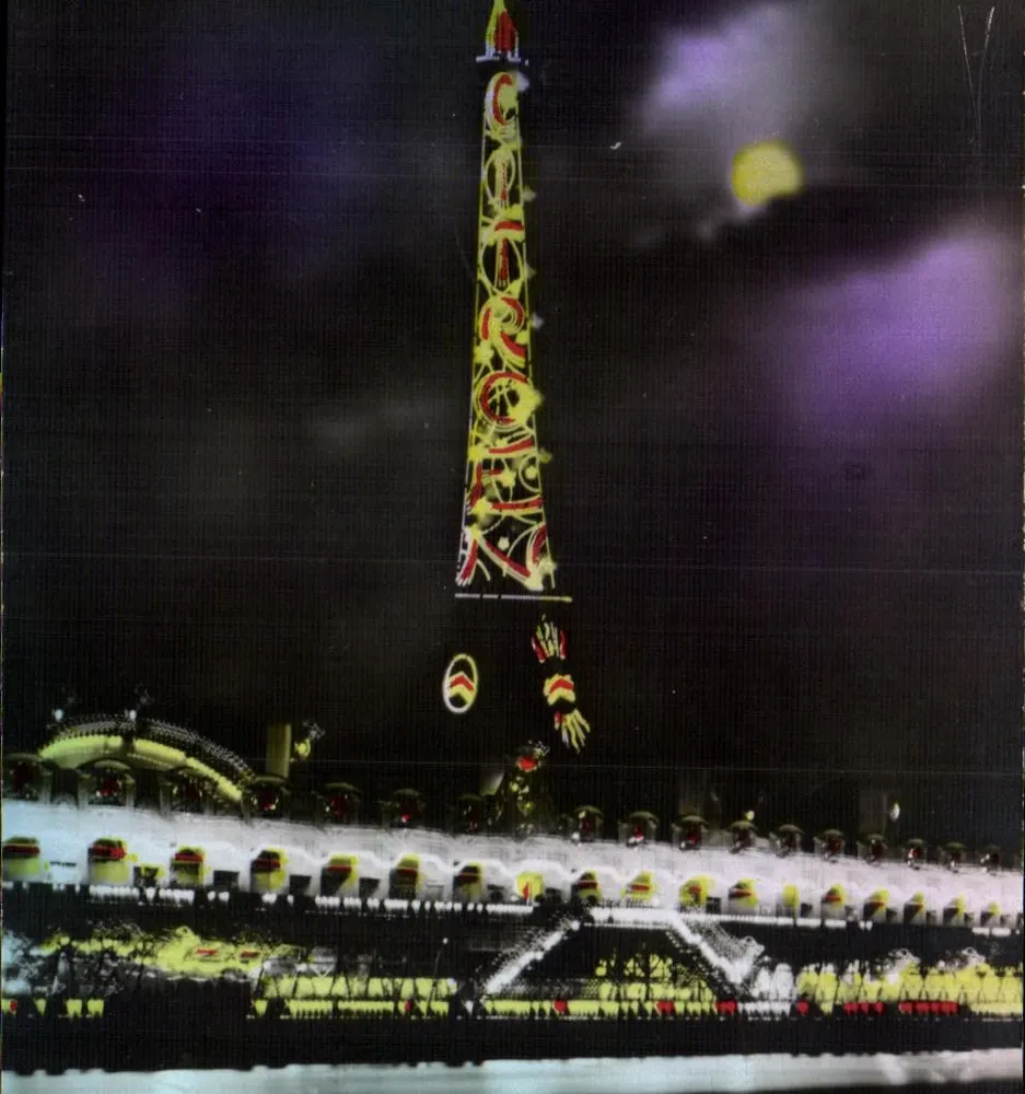 Eiffelturm beleuchtet — nächtliches Spektakel - Vorderseite