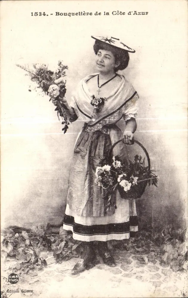 Bouquetière de la Côte d'Azur — femme en costume traditionnel tenant un bouquet et un panier de fleurs — Édition Giletta, n° 1534 - Vorderseite