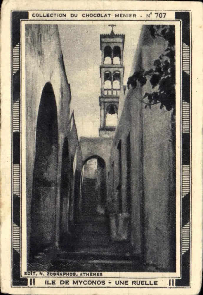 Ilha de Myconos — Uma ruela — Coleção do Chocolat-Menier, n° 707, edit. N. Zographos, Atenas - Frente