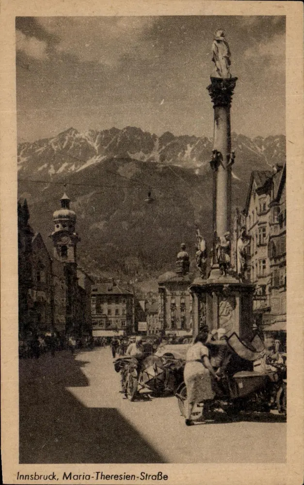 Innsbruck, Maria-Theresien-Straße — Monumentale Säule mit Statue, Berge im Hintergrund — Verlag Karl Redlich, Nr. K 76 - Vorderseite