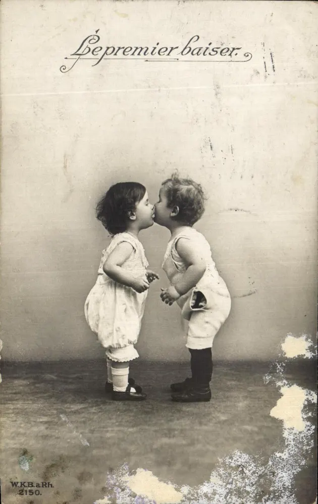 Deux enfants s'embrassant — scène intitulée 'Le premier baiser' — éditeur W.K.B.a.Rh. n°2150 - Frente