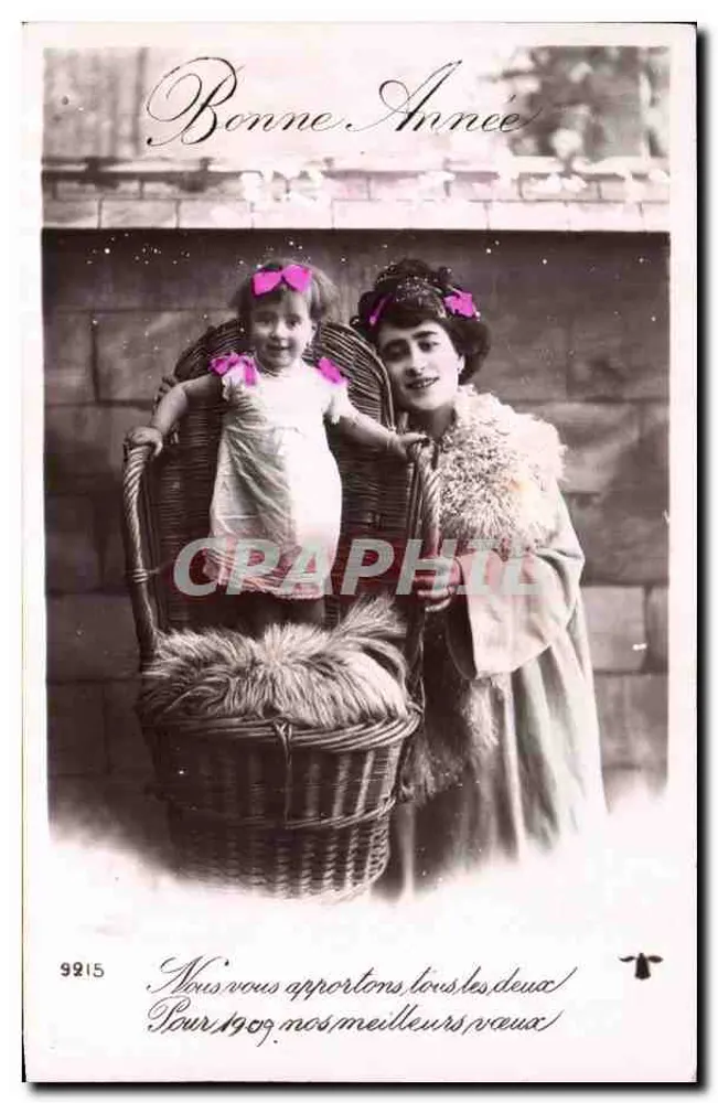 Frau und Kind in einem Korb — Frohe Weihnachten 1909 — Ansichtskarte n° 99215 - Vorderseite
