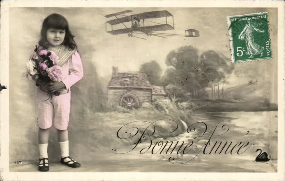 Fille tenant un bouquet — scène avec avion biplan et moulin à eau — éditeur non visible, n° de série 497 - Anverso