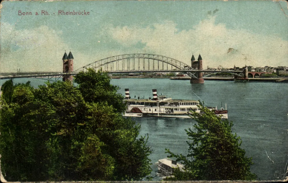 Bonn a. Rh. - Rheinbrücke — uitzicht op de rivier de Rijn met een stoomboot — uitgever niet zichtbaar - Voorkant