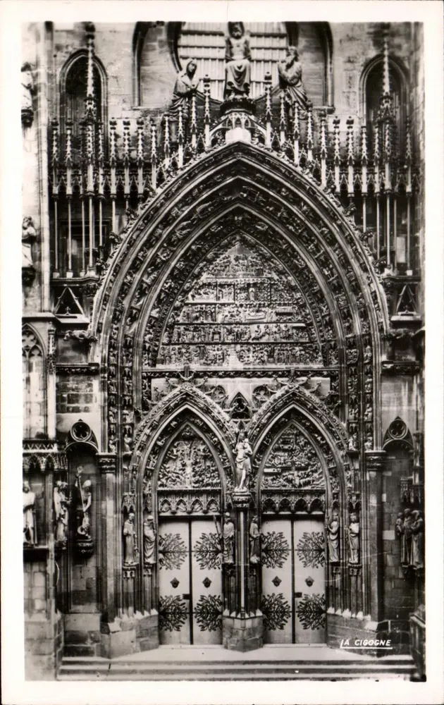 Thann — Catedral, portal central — La Cigogne, n° 68.334.43 - Frente