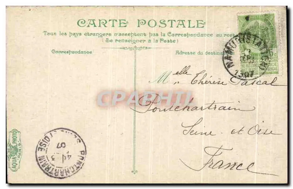 Namur, Place Léopold — estátua monumental no centro de uma praça cercada por edifícios comerciais — editor Sugnay, n° 1919 - Verso