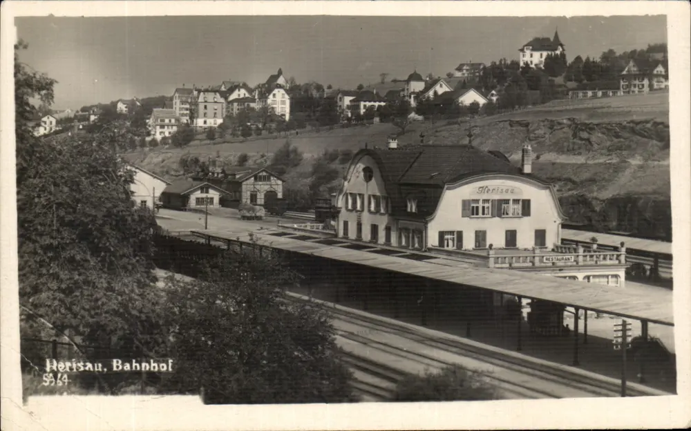Herisau, Bahnhof — vue du bâtiment de gare et du restaurant, éditeur Herisau, n° 5564 - Frente