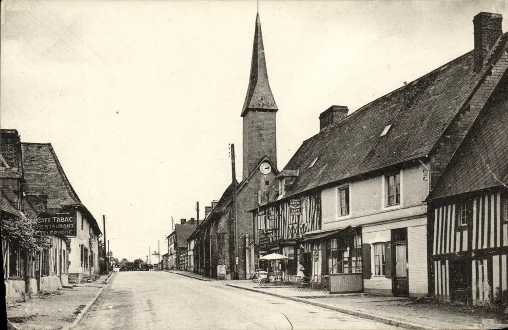 Vue de la rue principale — église avec clocher à flèche — éditeur Photo Editions Koch - Frente