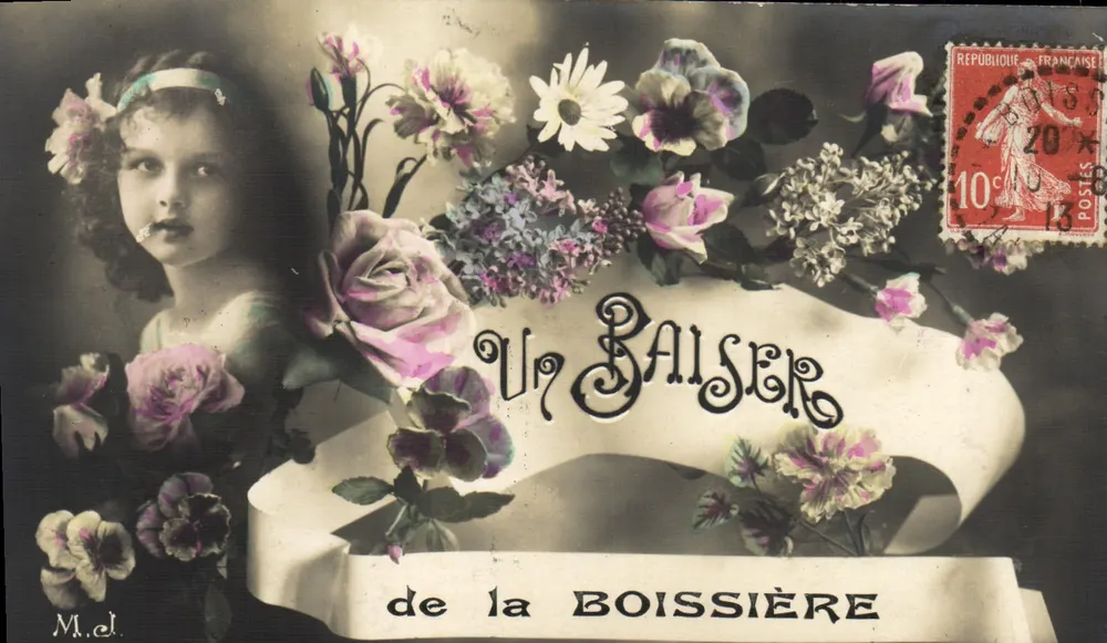 Fille entourée de fleurs — carte de vœux 'Un Baiser' de la Boissière, éditée par M. el - Frente