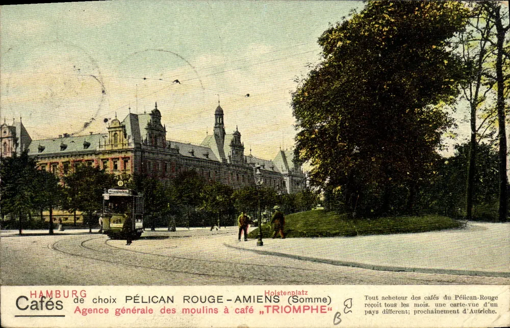 Holstenplatz (Somme) — Blick auf die Plaza mit Straßenbahn und Gebäude — Generalagentur der Kaffeerösterie "Triomphe" - Vorderseite