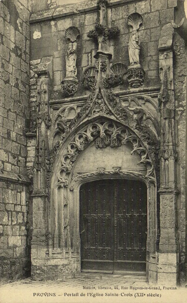 Provins — Portal der Kirche Sainte-Croix (12. Jahrhundert) — Mauris, Buchhändler, 44, Rue Hugues-le-Grand, Provins - Vorderseite