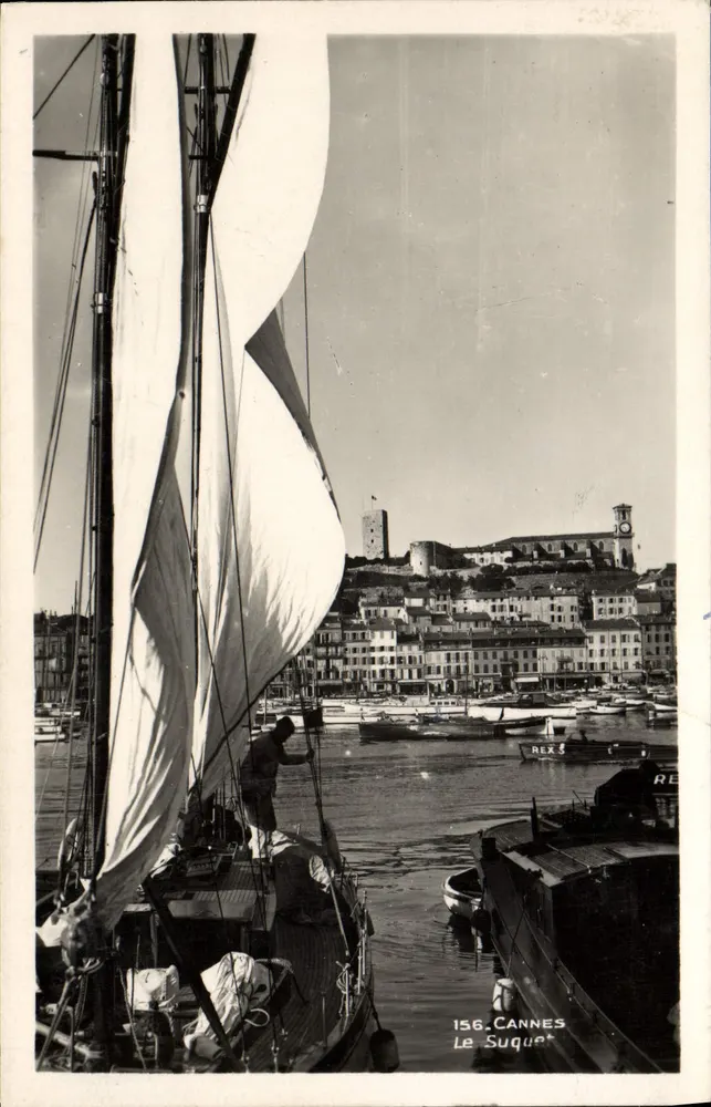 Cannes - Le Suquet — vue du port avec voile de bateau en premier plan, éditeur REX, n° 156 - Frente