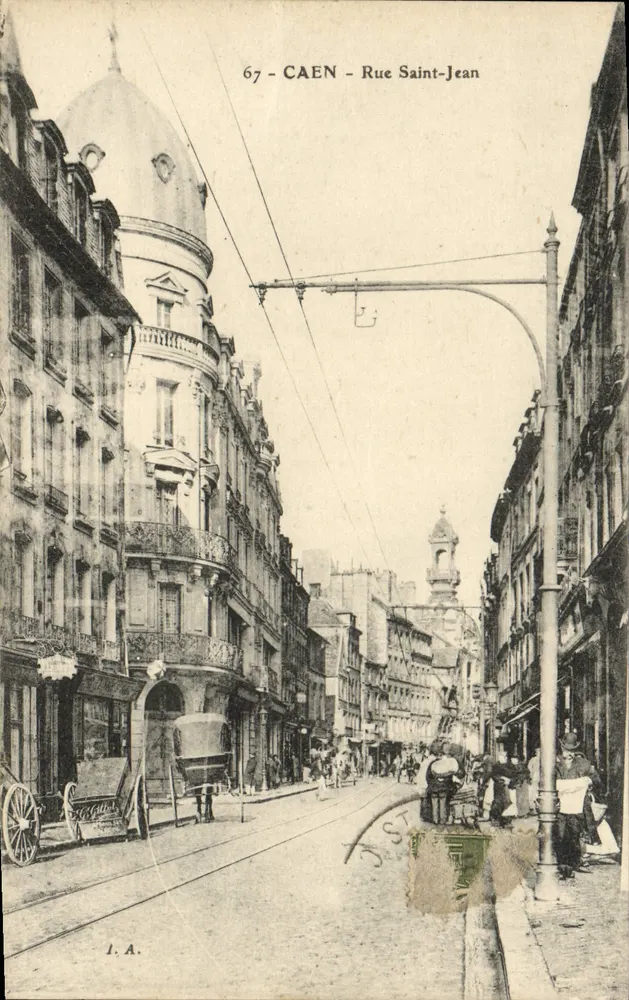 CAEN - Rua Saint-Jean — vista da rua com trêm e edifícios — editor J.A. n°67 - Frente