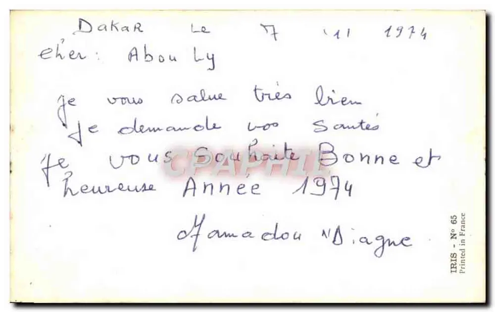 Criança africana — lavando as mãos em um balde — IRIS N° 65 - Verso