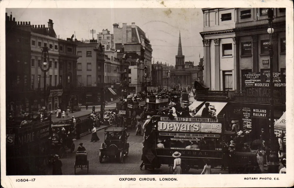 Oxford Circus, Londres — vista animada com trêm de Dewar's — Rotary Photo, E.C. n° 10504-17 - Frente