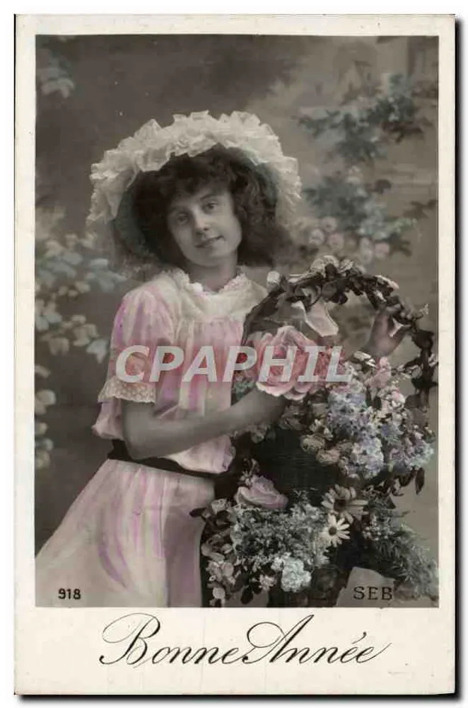 Joven mujer en vestido rosa que sostiene un ramo de flores — Buen Año — SEB n° 918 - Anverso