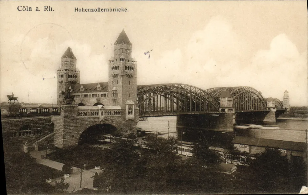 Cöln a. Rh. — Hohenzollernbrug met torens en metaalbrug — Verlag v. Joh. Henrags, Cöln a. Rhein. - Voorkant