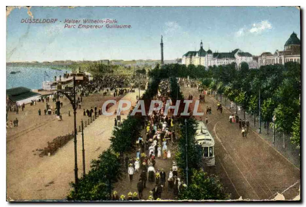 Düsseldorf - Kaiser Wilhelm-Park — Panoramablick auf den Park mit Promenade, Straßenbahn und Denkmal, Verlag 'CPAPHIL' (gedruckt auf der Karte) - Vorderseite