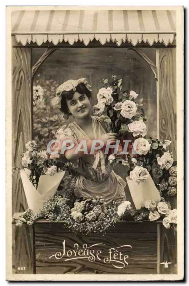 Jeune femme souriante — devant un étal de fleurs sous auvent rayé — éditeur 'Leveuse Fête' n°667 - Vorderseite