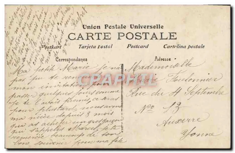Frau am Tisch — gedruckter und handschriftlicher Text — Universal Postal Union - Rückseite