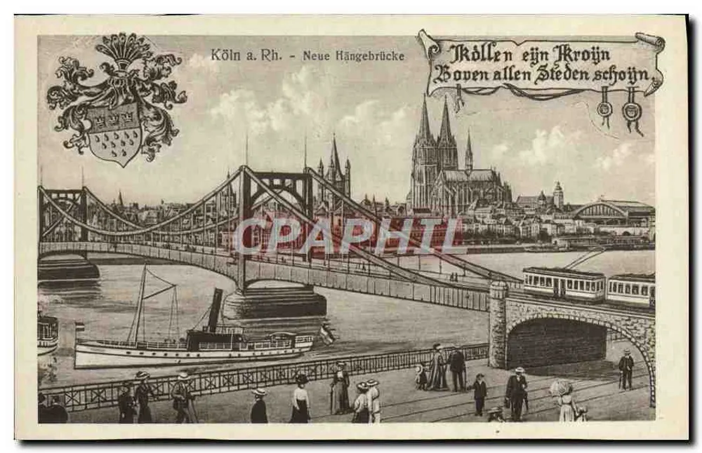 Cologne a. Rh. - Neue Hängebrücke — vista de la catedral y del puente colgante con tranvía y barco - Anverso