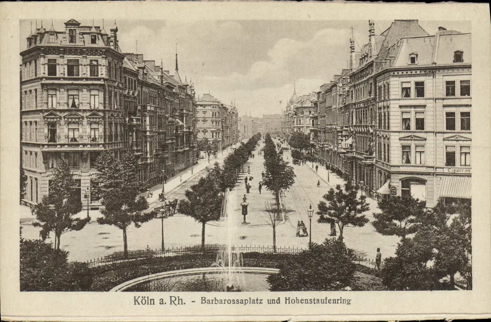 Cólnia a. Rh. - Barbarossaplatz e Hohenstaufenring — vista urbana com fonte e edifícios - Frente