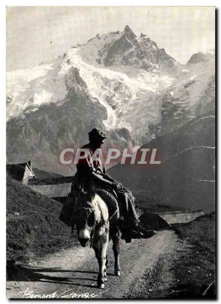 Montagne enneigée — homme à cheval sur une route de montagne — éditeur Bernard Grange - Voorkant