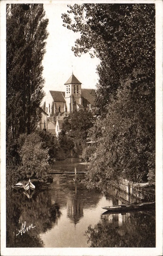 Montigny-sur-Loing — die Kirche vom Kanal aus gesehen — Alm - Vorderseite