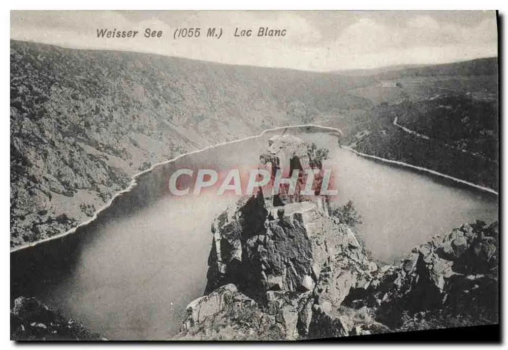 वाईसर सी (1055 मीटर) लैक ब्लैंक — एक झील के चारों ओर घिरे पर्वतों का व्यापक दृश्य — जान्हलेइसेन-वेलांड, म्यूनस्टर - आगे