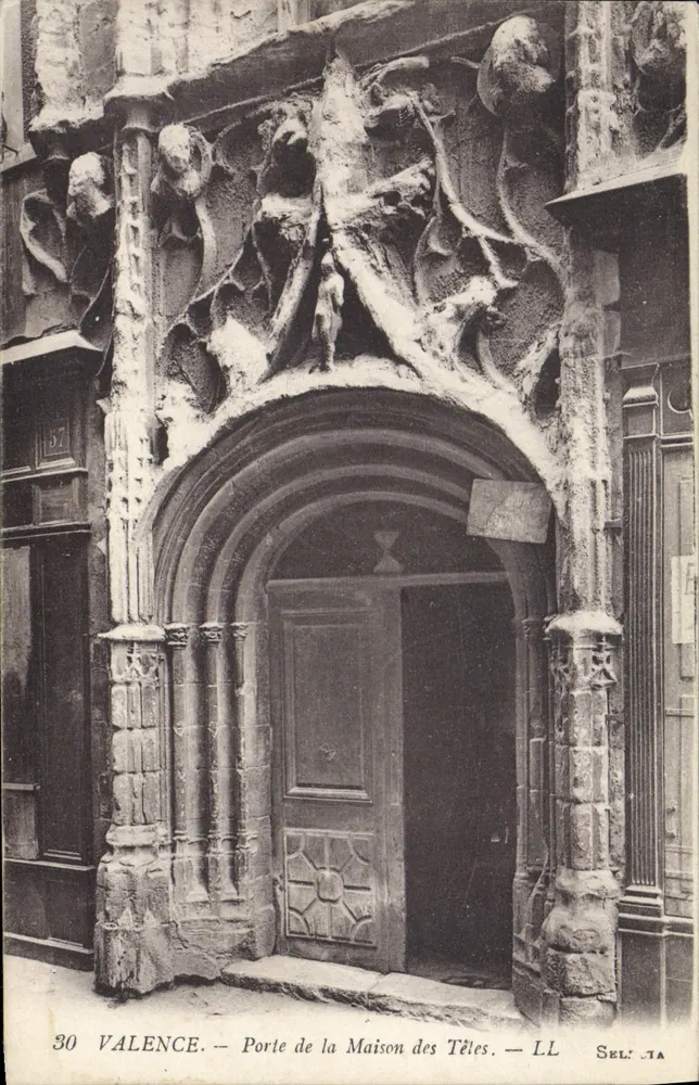 Valência — Porta da Maison des Têtes — LL Sel' JA - Frente
