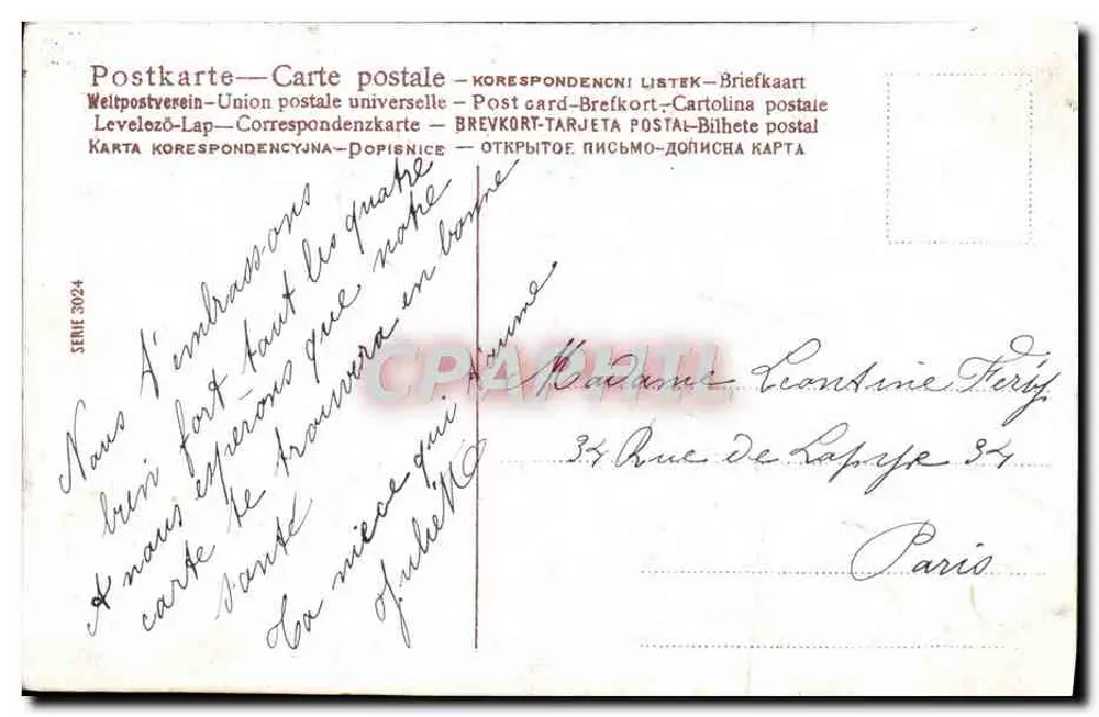 Main tenant une carte avec 'Bonne et heureuse Année' — décor de fleurs bleues — éditeur non visible - Verso