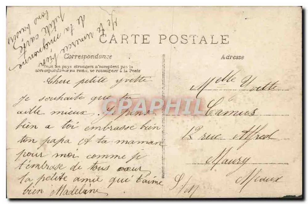 Menina pequena vestindo um vestido azul segurando um buquê — A.N. Paris, n°698 - Verso