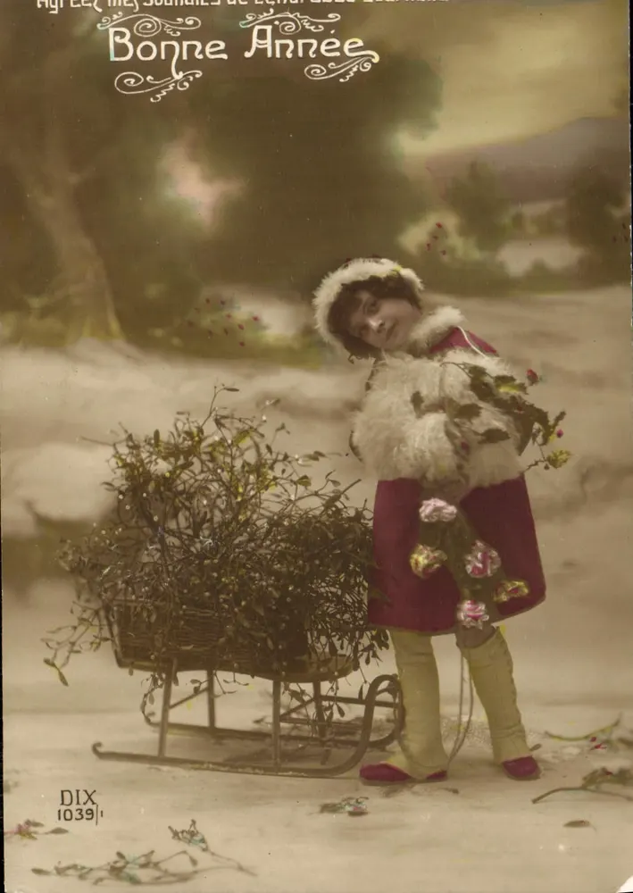 Frau in rotem Mantel und Fellmütze — mit Tannenschneeschlitten — Verlag DIX n° 1039 - Vorderseite