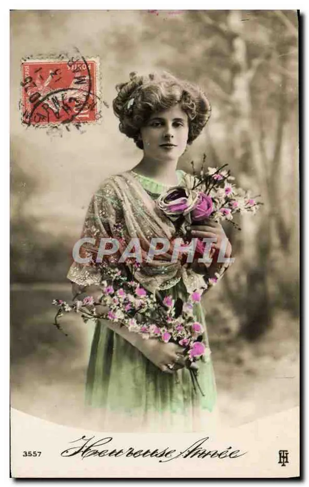 Femme en robe verte tenant un bouquet — éditeur H. H. n° 3557 - Recto
