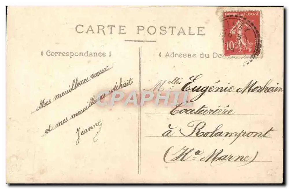 Jeune femme tenant un panier de fleurs — Bonne Fête — éditeur inconnu - Verso