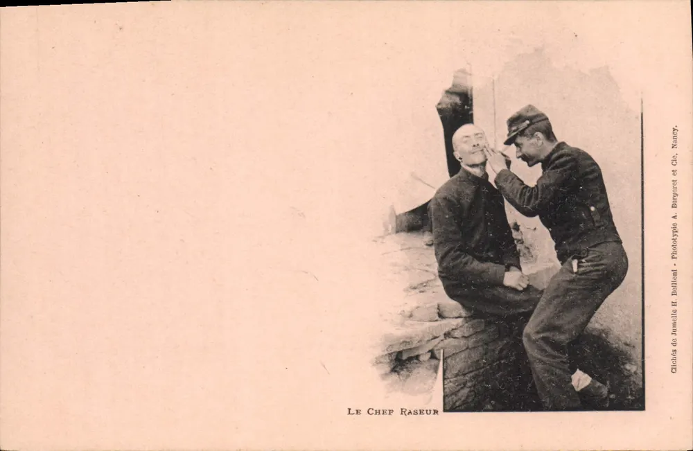 El Raso Capo — escena de afeitar militar — Clichés de Jammolle H. Ballioni, Nancy - Anverso