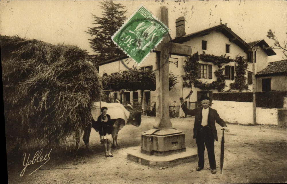 Yobled — Dorfkreuz mit Kuh und Mann — Yobled - Vorderseite