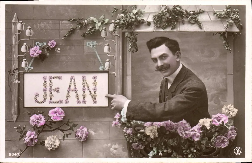 Mann, der auf ein Schild 'JEAN' zeigt — Blumendekor — Verlag SP, Nr. 2047 - Vorderseite