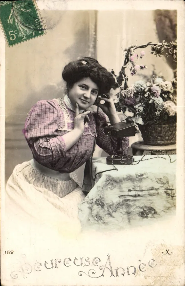 Mulher ao telefone — 'Beureuse Année' — Union Postale Universelle, n°162 - Frente