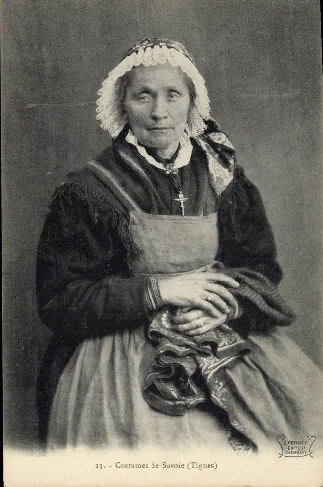 Costumes de Savoie (Tignes) — Sujet : femme en costume traditionnel — Éditeur E. Reynaud, Chambéry, n°13 - Frente