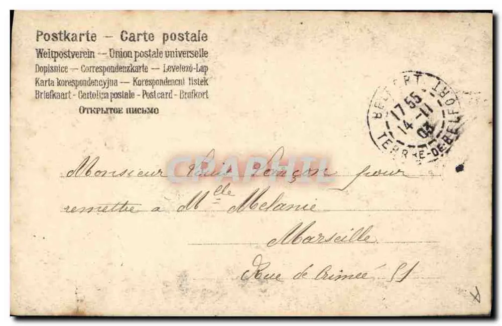 Mulher com chapéu de largas bordas — criação de moda — editor não identificado - Verso