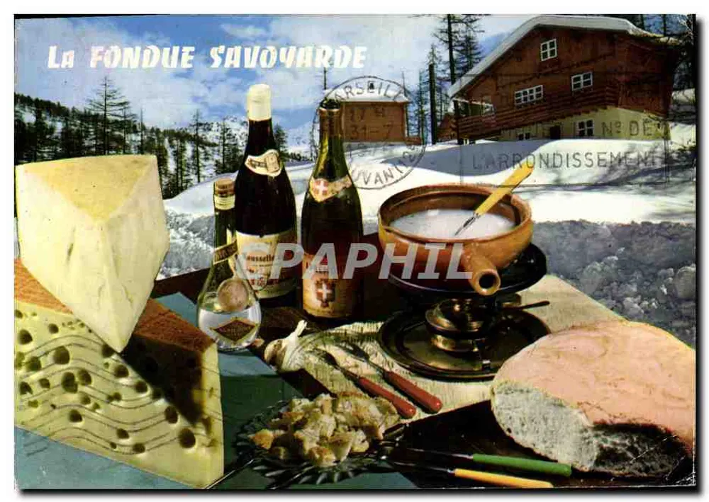 La Fondue Savoyarde — scène de table avec fromages et fondue devant un chalet enneigé — éditeur L'ARRONDISSEMENT, n° DE série visible - Frente