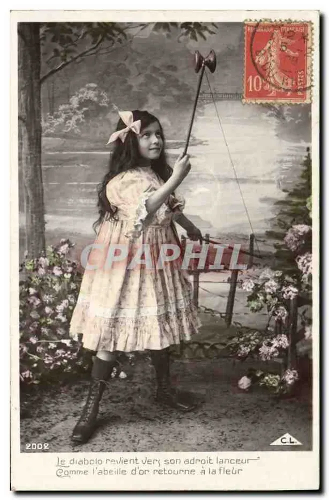 Menina brincando com diabolo — C.L. — n° 2002 - Frente