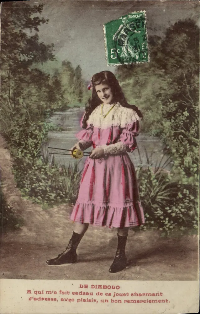 Menina em vestido rosa — brinquedo — LE DIRIBOLO - Frente