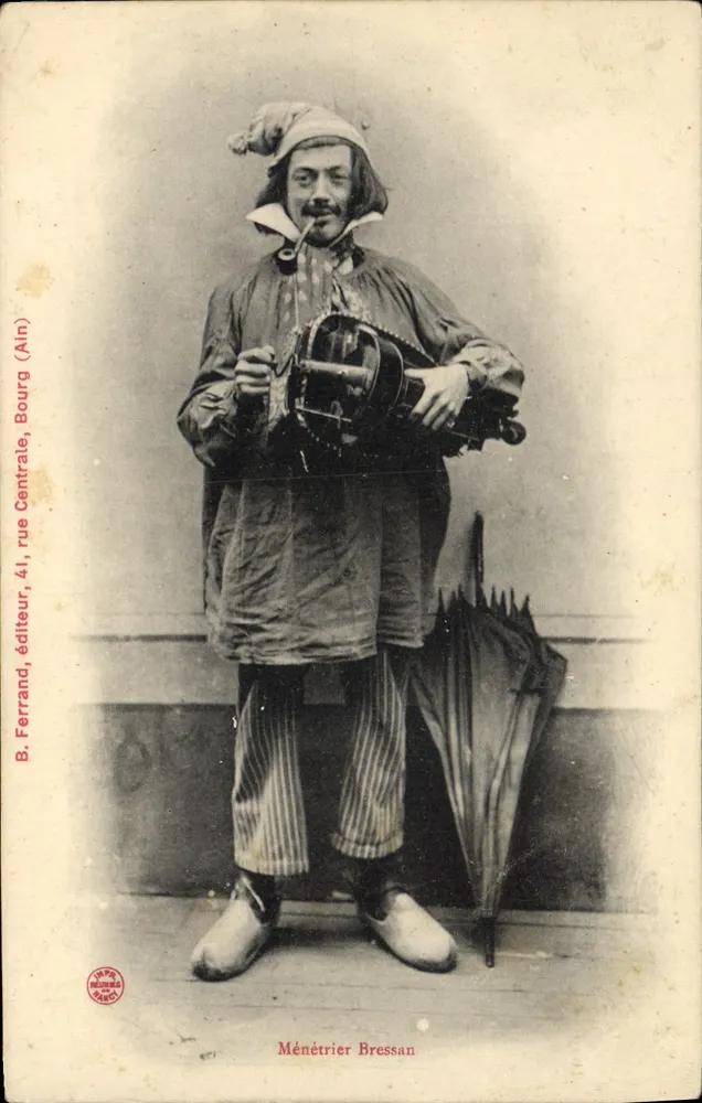 Ménétrier Bressan — homem em traje de palhaço com guarda-chuva — B. Ferrand, editor, Bourg (Ain) - Frente